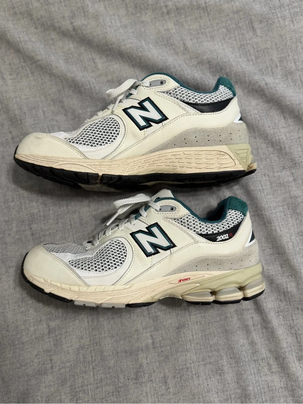 New Balance White Sneakers with Teal Lining and Navy Accents